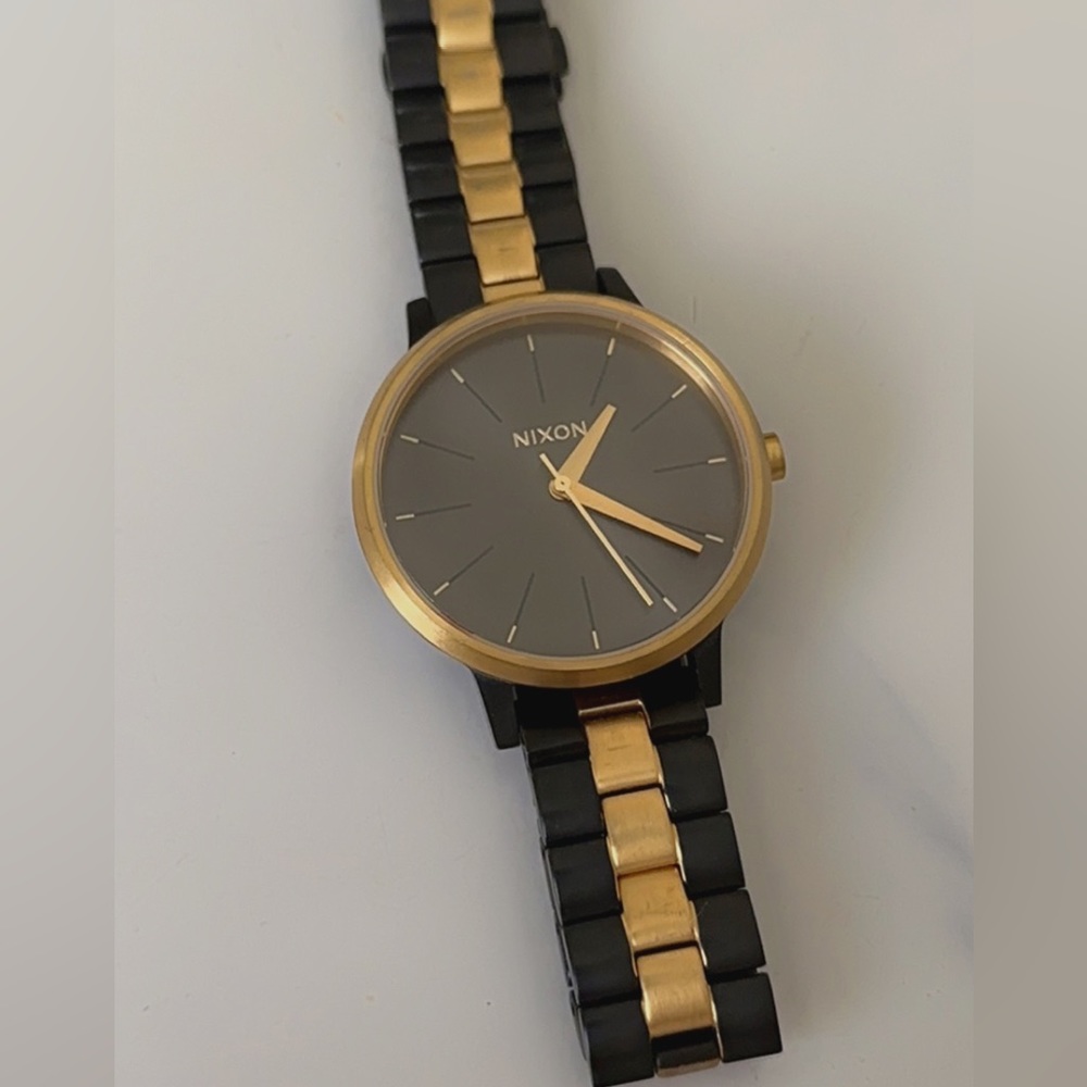 NIXON gold and black watch